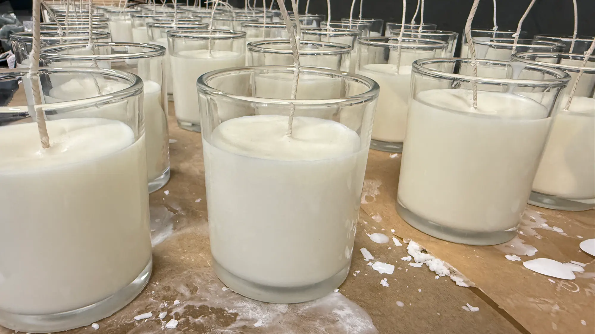 Freshly poured Everlore Hollow candles cooling together in the workshop