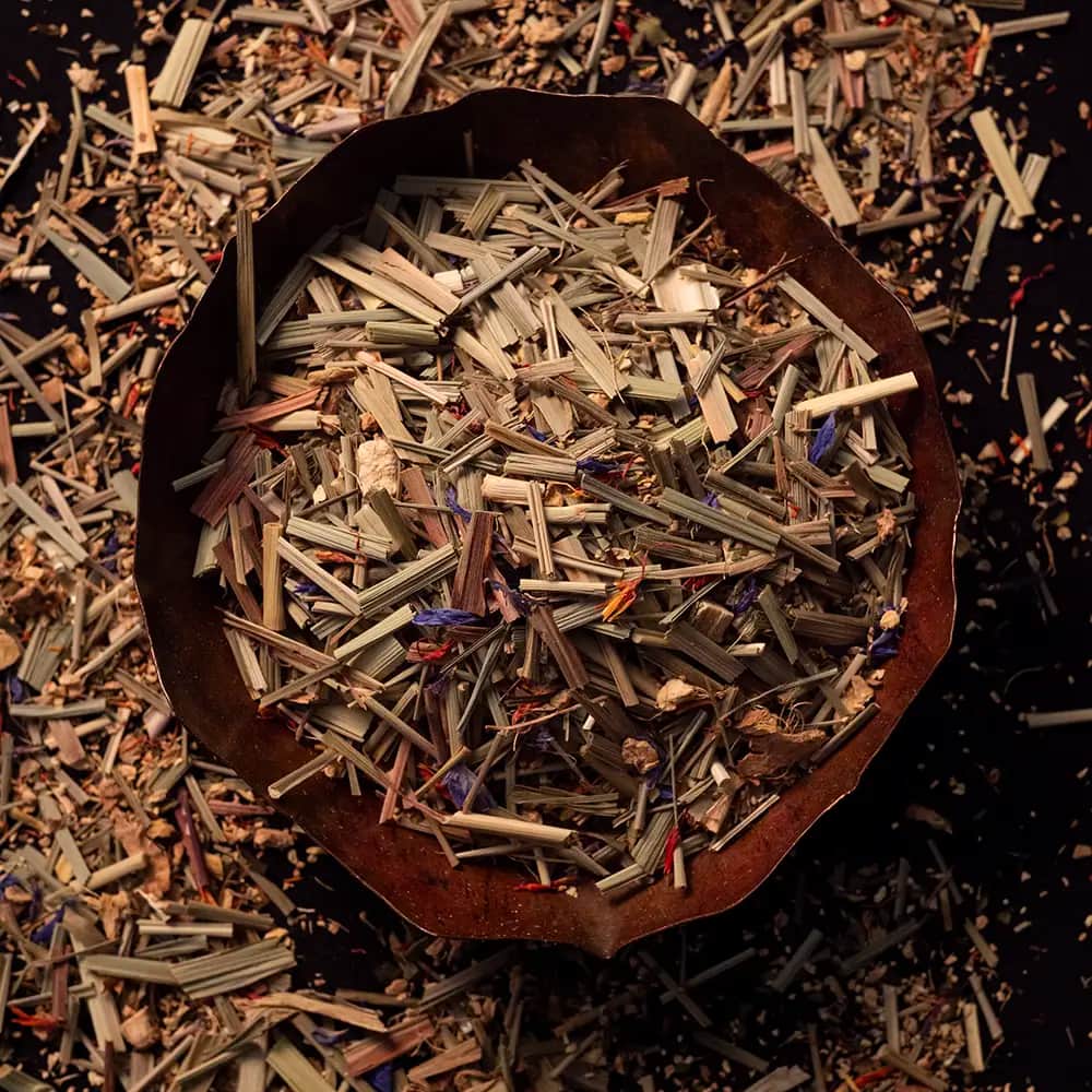 Small-batch apothecary tea blend with rose petals and dried herbs