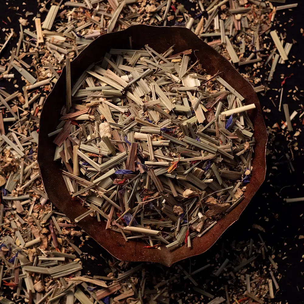 Small-batch apothecary tea blend with rose petals and dried herbs